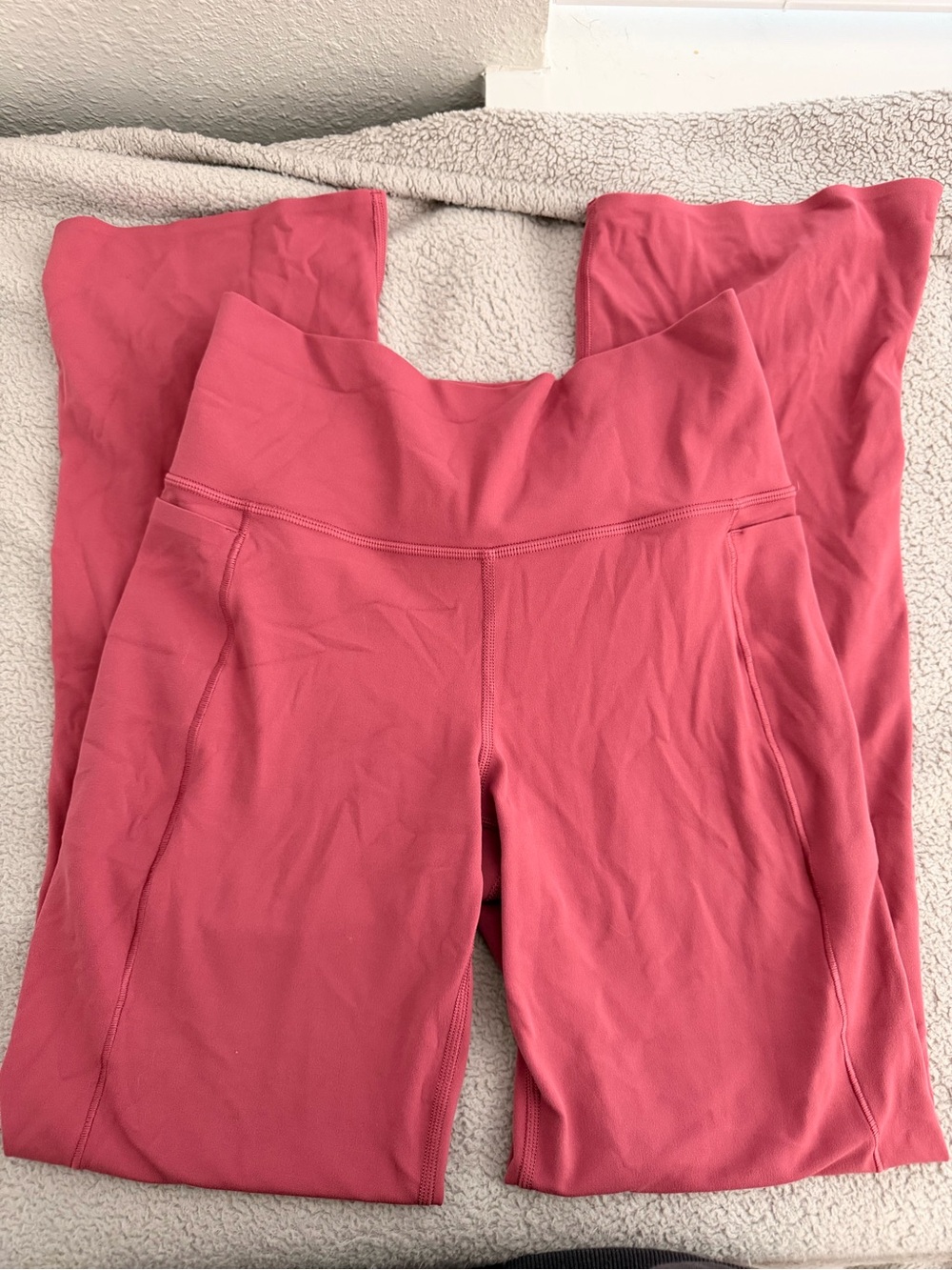 Athleta pink petite flare leggings with slit at bottom